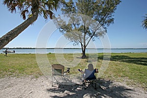 Young girl at Fort De Soto Park campsite in Pinellas County, Florida.