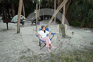 Young girl at Fort De Soto Park campsite in Pinellas County, Florida.