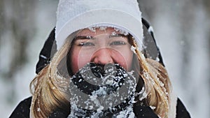 A young girl freezes in the woods in winter.