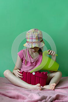 Young girl with garden pot