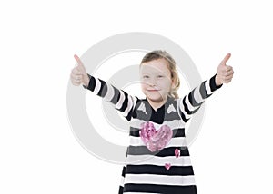 Young girl giving a thumbs up sign