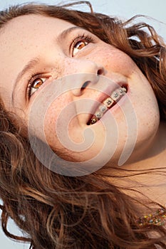 Young girl glancing away