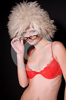 Young girl in glasses and furry hat