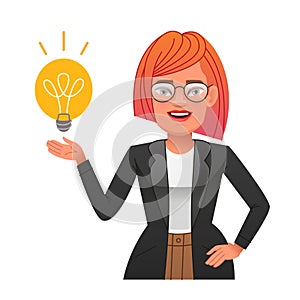 Young girl with glasses holds a light bulb over her hand. Woman has an idea. Portrait of a happy businesswoman. Smart white lady