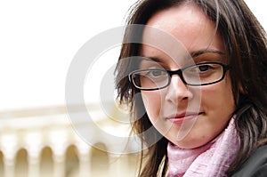 Young girl with glasses and scarf