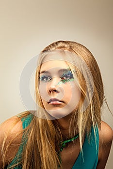 Young girl in green dress.