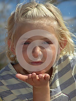 Young girl with hand held out
