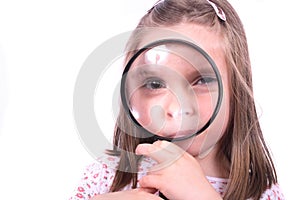 Young girl and handglass photo