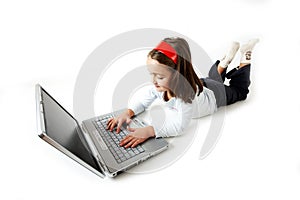 Young girl handling a laptop