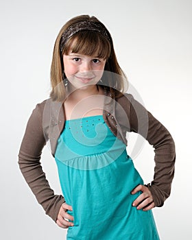 Young girl with hands on hips photo