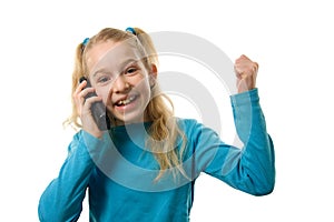 Young girl is happy on the phone