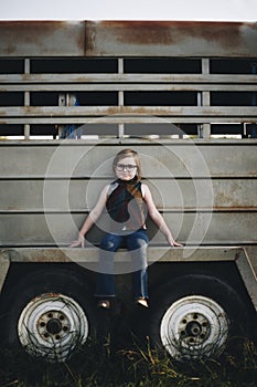 A young girl is having fun in the farm