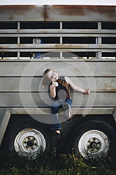 A young girl is having fun in the farm