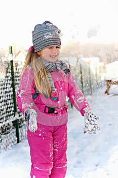 Young girl having fun in winter