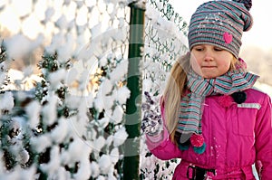 Young girl having fun in winter