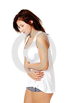 Young girl having a stomachache.