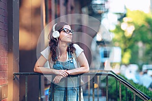 Young girl in headphones in New York