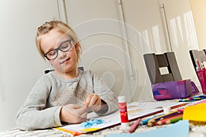 Young Girl and Her Art Project