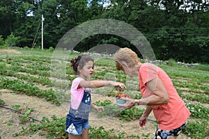A young girl and her grandmother having fun together