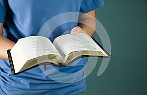 Young Girl Holding Bible