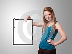 Young girl holding black folder with white sheet copy space