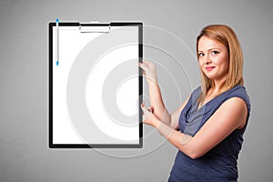 Young girl holding black folder with white sheet copy space