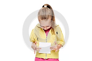 Young girl holding blank card infront of her. Speech therapy concept on white background.