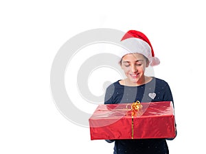 Young girl holding a Christmas present