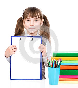 Young girl holding clipboard with blank paper. isolated on white