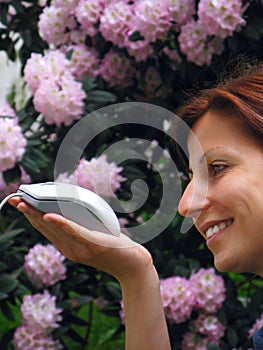 Young girl holding computer mouse