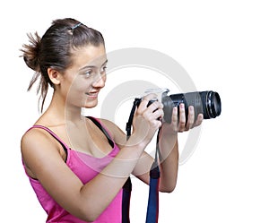 Young girl, holding a digital camera