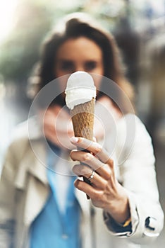 Young girl holding in female hands cone sweet icecream, tasty frozen summer dessert, hipster woman eating white ice cream close up