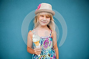 Young girl holding ice cream cone