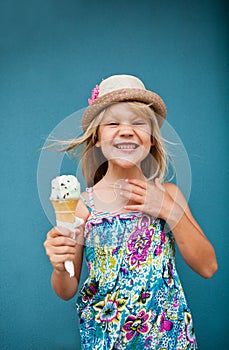Young girl holding ice cream cone