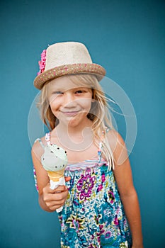 Young girl holding ice cream cone