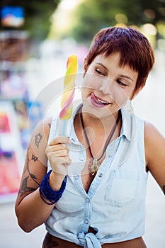 Young girl holding an ice lolly photo