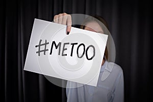 Young girl holding  MeToo poster