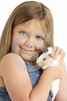 Young Girl Holding Pet Guinea Pig