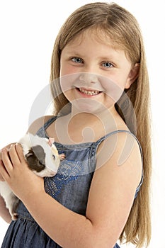 Young Girl Holding Pet Guinea Pig