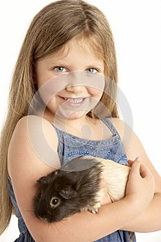 Young Girl Holding Pet Guinea Pig