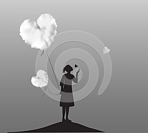 Young girl holding the white cloud heart, Valentines day, romantic time in dreamland, black and white,