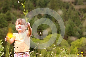Young Girl Holding Wildflower