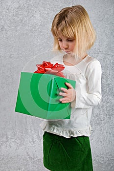 Young Girl Holds Christmas Present