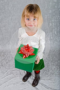 Young Girl Holds Christmas Present