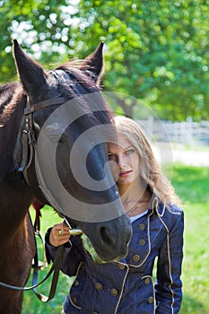 Young girl with a horse.