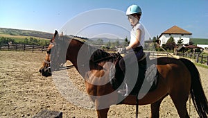 Young girl on horse back