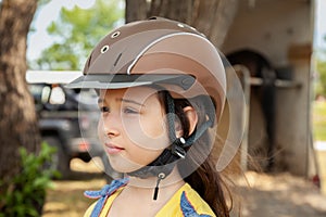 Young Girl During a Horse Riding Lesson