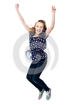 Young girl jumping in excitement