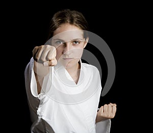 Young girl in a karate stance