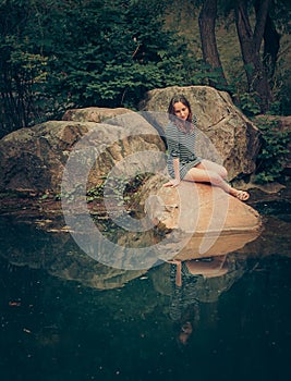 Young girl on the lake